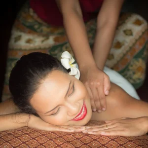 woman-smiling-while-giving-massage